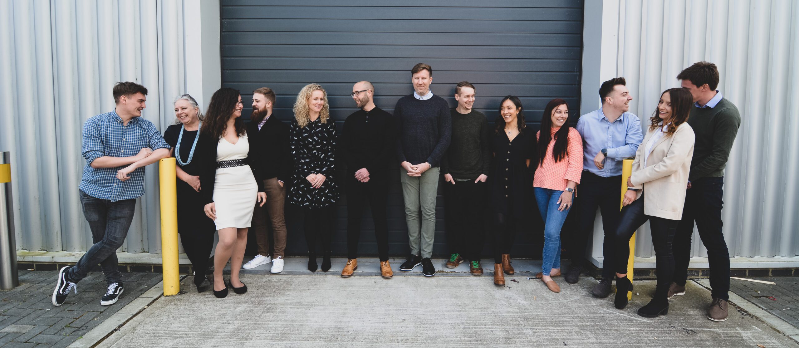 Group shot of the Swagpack team outside of their warehouse