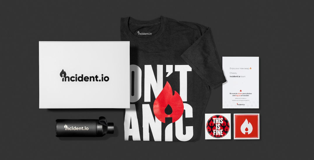 Image: An employee Swag Pack showing a company branded tshirt, stickers and water bottle