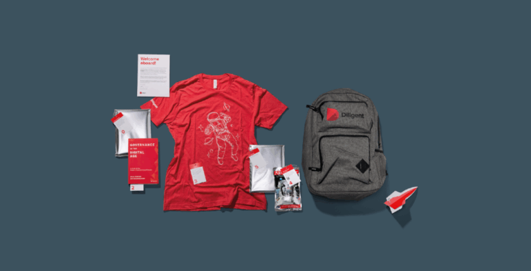 Image: Branded merchandise welcome packs showing a branded tshirt, rucksack, and pens