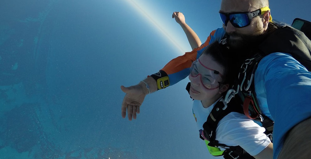 Erin doing a tandem skydive 14000 feet in the air